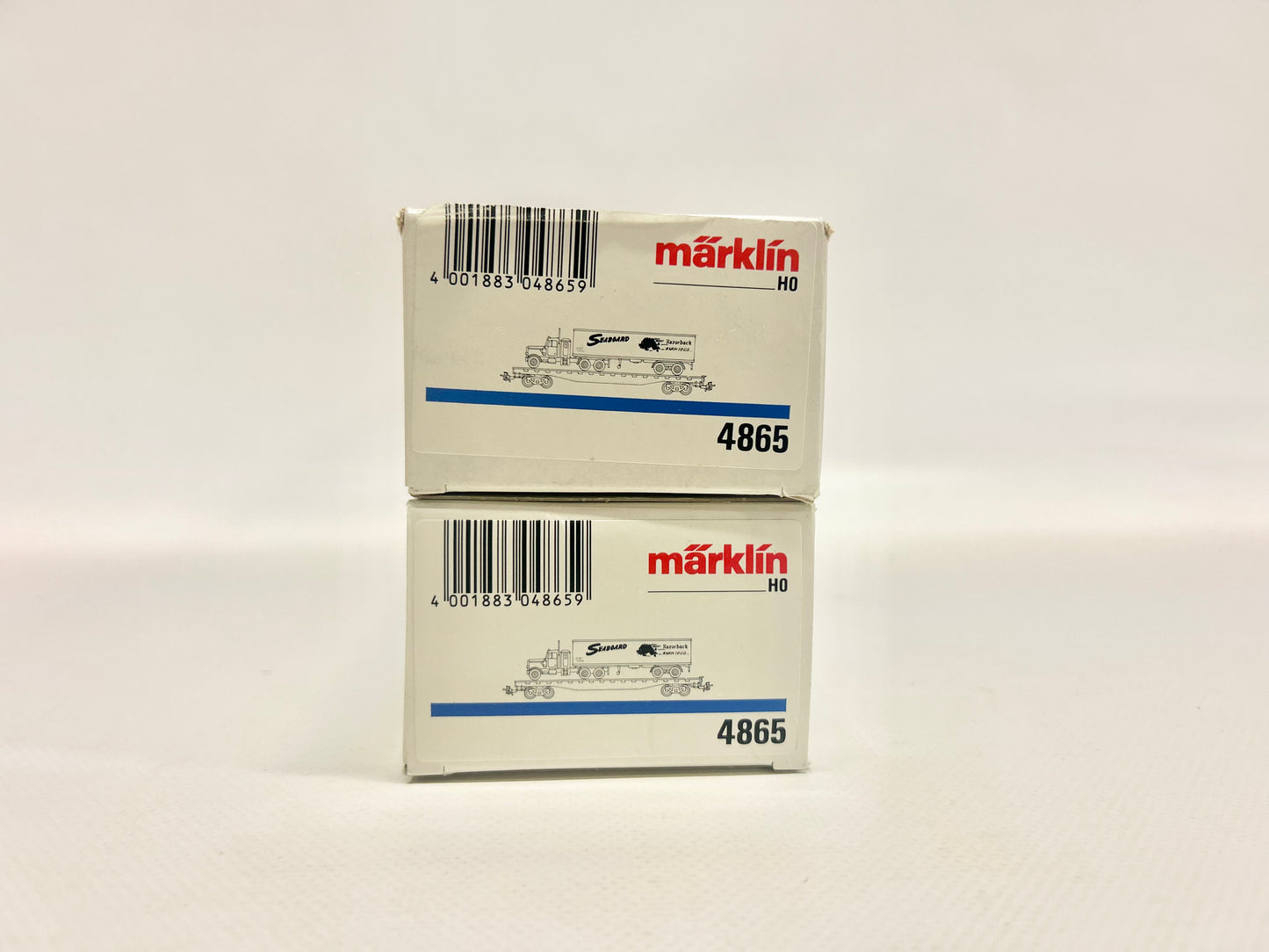 Märklin 2x 4865 Güterwagen Flat Cars mit LKW USA