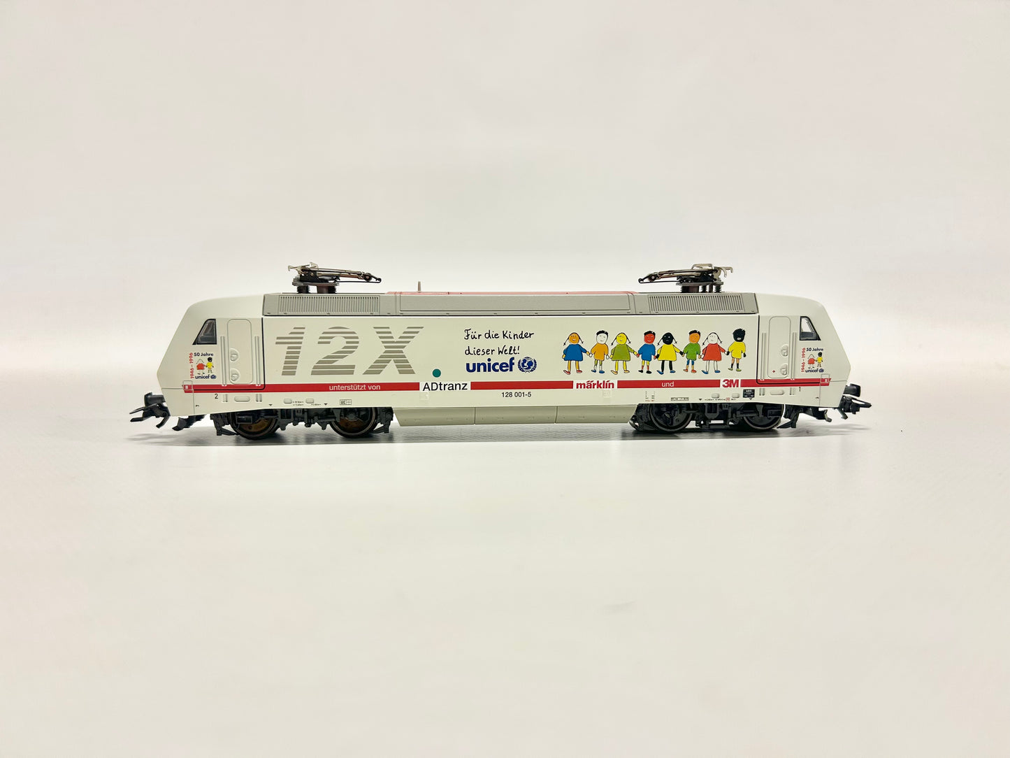 Märklin 34382 Digital Br 128 E-Lok "Unicef" DB H0