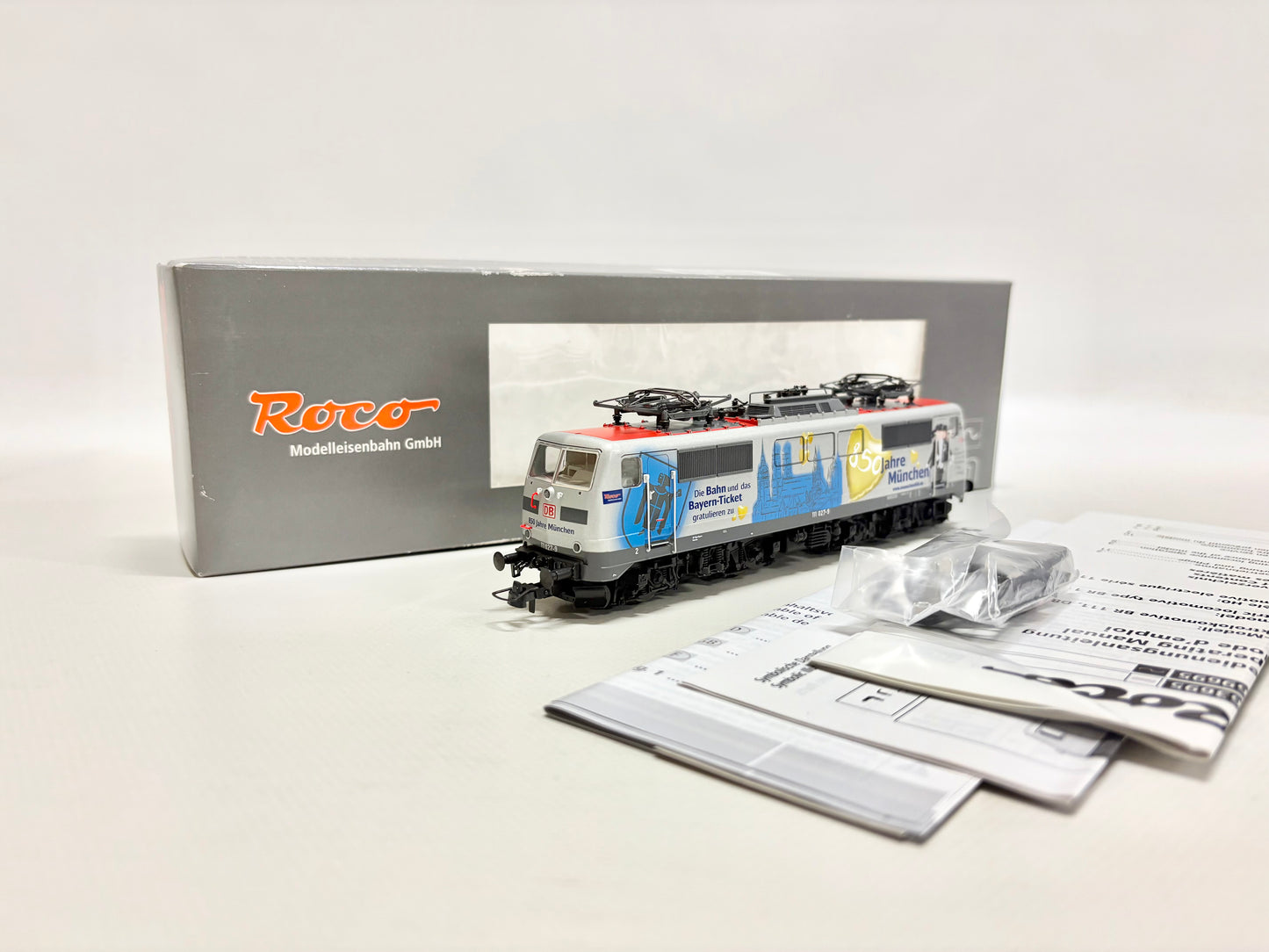 Roco 69695 DSS E-Lok Br 111 027-9 "850 Jahre München" DB AC H0