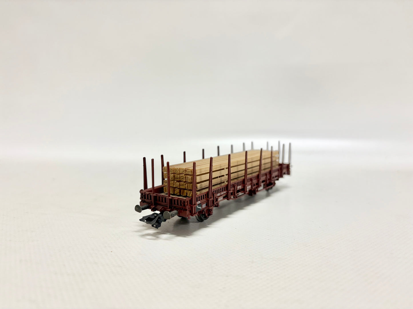 Roco Güterwagen Rungenwagen mit Holzladung ÖBB DC H0