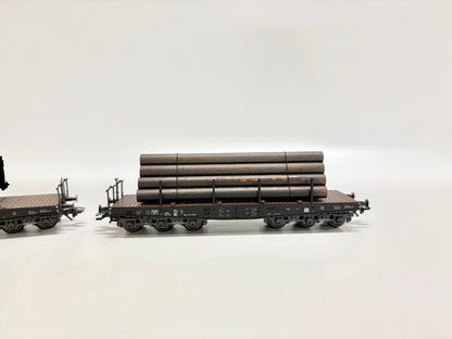 Märklin 2x Schwerlastwagen mit Ladung DR AC H0