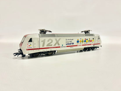 Märklin 37382 Digital E-Lok Br 128 001-5 Unicef DB AC H0