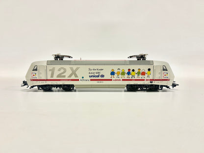Märklin 37382 Digital E-Lok Br 128 001-5 Unicef DB AC H0