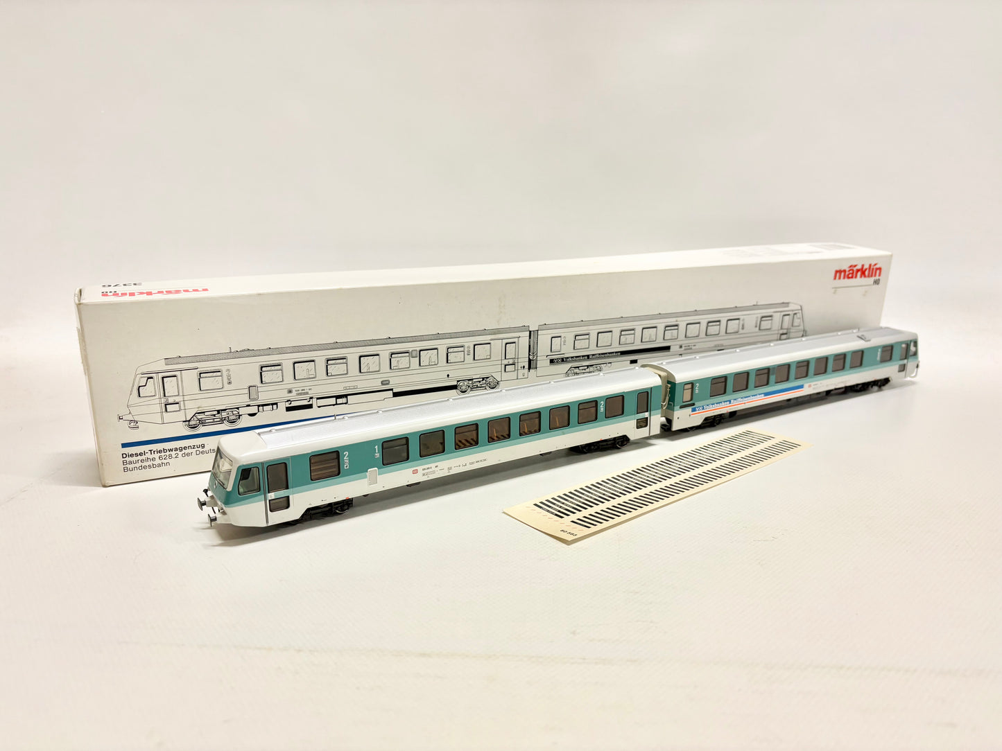 Märklin 3376 Dieseltriebwagen Br 628 203-2 "Volksbank" DB AC H0