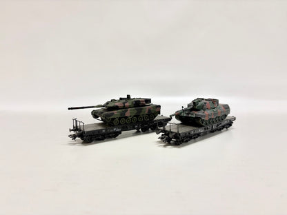 Märklin 2x Schwerlastwagen mit Panzer DB AC H0