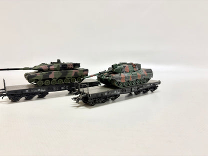 Märklin 2x Schwerlastwagen mit Panzer DB AC H0