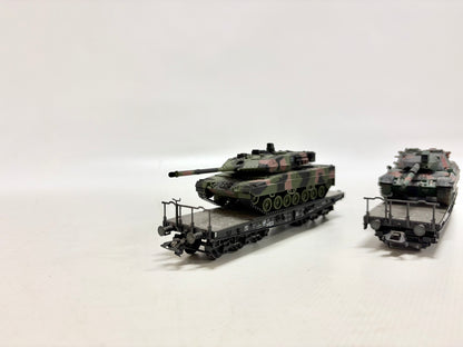 Märklin 2x Schwerlastwagen mit Panzer DB AC H0