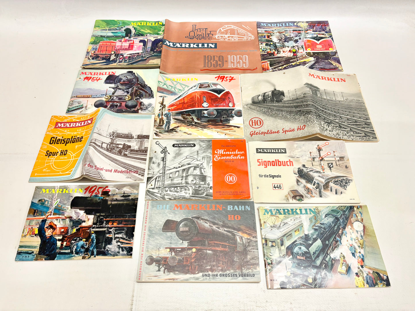 Märklin 12x Katalog/ Gleisplanbuch usw. 1950er Jahre