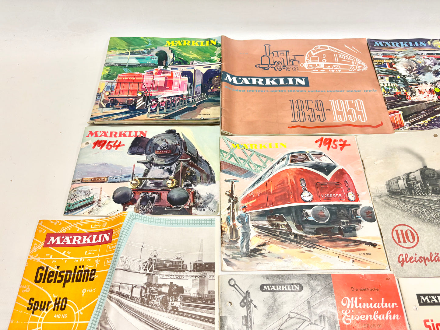 Märklin 12x Katalog/ Gleisplanbuch usw. 1950er Jahre