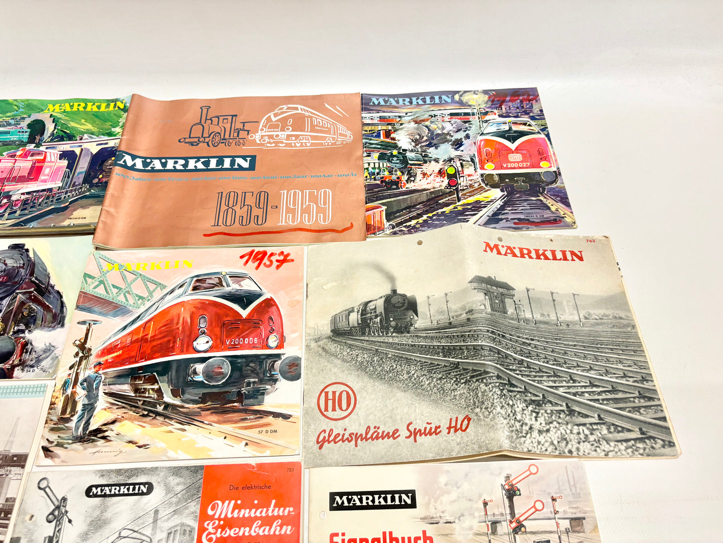 Märklin 12x Katalog/ Gleisplanbuch usw. 1950er Jahre